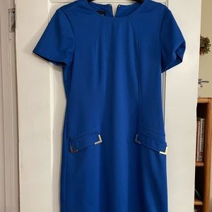 Blue formal dress with gold accents